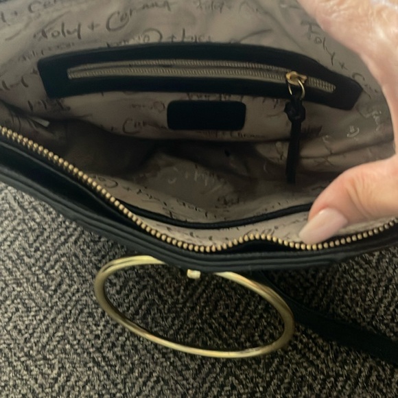 Foley + Corinna crossbody bag in black pebble leather, featuring brass accents. - Picture 3 of 4